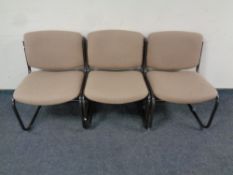 Three contemporary office chairs