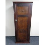 An oak sentry door wardrobe