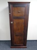 An oak sentry door wardrobe