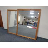 Two contemporary pine framed beveled mirrors