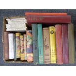 A box containing 20th century children's books to include J M Barrie's Peter and Wendy,