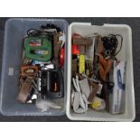 Two crates containing assorted power tools, hand tools,