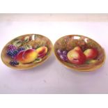 Two Royal Worcester gilt-rimmed small circular dishes, with hand painted Fruit decoration,