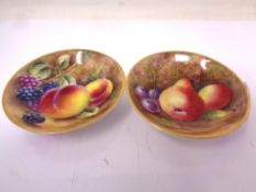 Two Royal Worcester gilt-rimmed small circular dishes, with hand painted Fruit decoration,