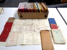 A box containing a large quantity of folded maps to include Ordnance survey,