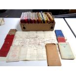 A box containing a large quantity of folded maps to include Ordnance survey,