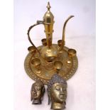 An eight piece Middle Eastern brass tea service comprising of teapots,
