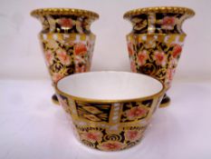 A pair of Royal Crown Derby Imari patterned miniature vases, height 6.