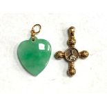 A gold mounted jade heart pendant together with a yellow metal cross