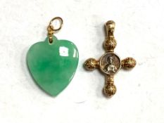 A gold mounted jade heart pendant together with a yellow metal cross