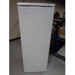 A upright freezer.