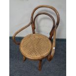 A child's beech bentwood armchair