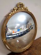 A 20th century circular gilt framed convex mirror