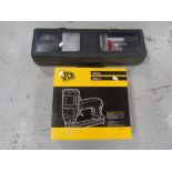 A JCB nail gun (boxed) together with a cased laser level kit