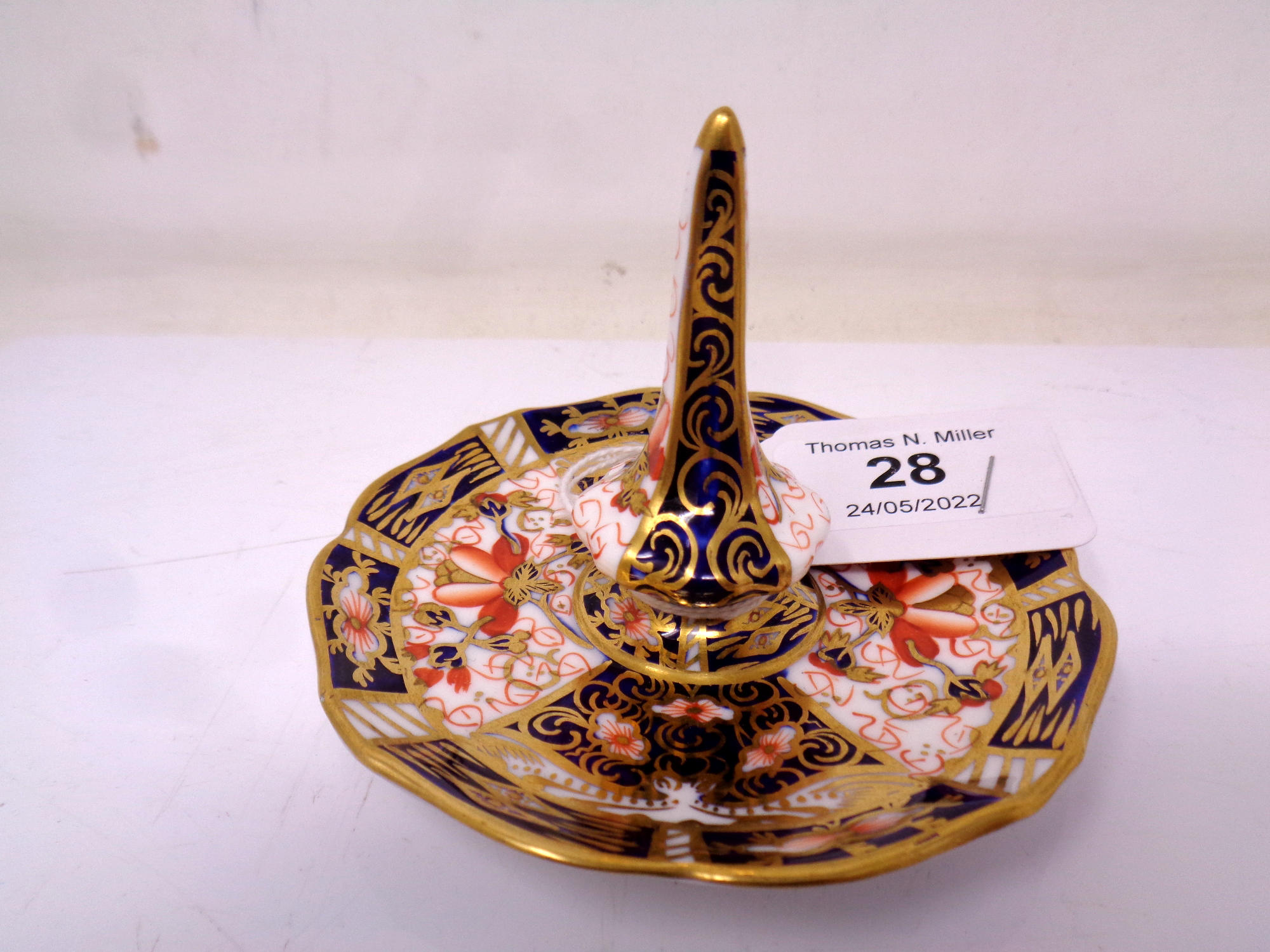 A Royal Crown Derby Imari pattern ring stand, height 7 cm.