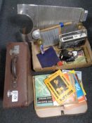 A box and a case containing sheet music, Alba radio, one-man band wash boards,