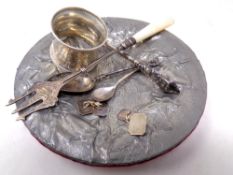 A small collection of silver to include a pronged pickle fork, handled button hook,