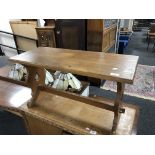 An oak refectory coffee table