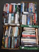 Four boxes containing a good selection of hard backed books, novels to include David Jackson,