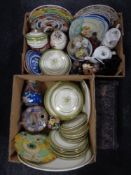 Two boxes containing antique and later ceramics to include wall plates, novelty teapot,