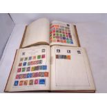 Two 20th century stamp albums containing a quantity of antiquarian and later world stamps