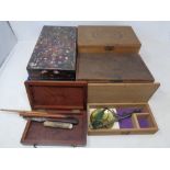 A tray containing antique and later wooden boxes, cigar boxes, cased opium scales.