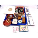 A tray of vintage and later costume jewellery, coin,