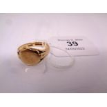 A 9ct gold signet ring, size V. CONDITION REPORT: 5.9g.