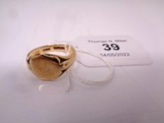 A 9ct gold signet ring, size V. CONDITION REPORT: 5.9g.