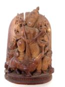 A finely carved Indian hardwood panel depicting Durga