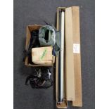 A box containing projector screen and projector together with a bag containing a Pentax MZ camera