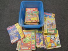 A box containing 1980's Pippin comics.
