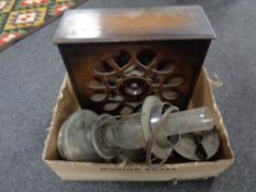 A box containing an early 20th century Amplion Cone speaker together with an oil lamp with glass