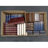 Two boxes containing Dickens and H G Wells books together with encyclopedia,