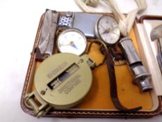A small collection of miscellaneous items to include compass watch, two further compasses,