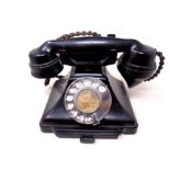 A vintage Bakelite cased telephone