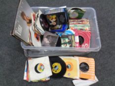 A box containing vinyl LPs 7" singles and DVDs to include Tina Turner, Cat Stevens,