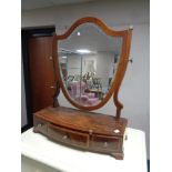 A Victorian inlaid mahogany toilet mirror