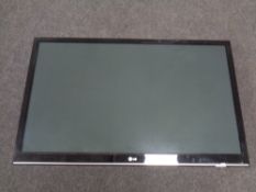 An LG 50" LCD TV with lead and remote and wall mounting bracket