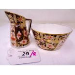 A Royal Crown Derby Imari pattern miniature sugar bowl and cream jug set, bowl height 4 cm,