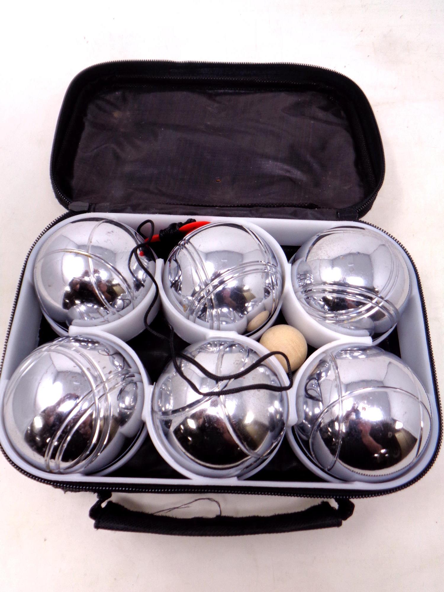 A cased set of French boules.