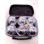 A cased set of French boules.