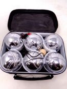 A cased set of French boules.