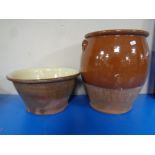 An antique glazed stone ware crock pot together with a mixing bowl.