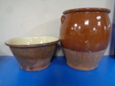 An antique glazed stone ware crock pot together with a mixing bowl.