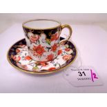 A Royal Crown Derby Imari pattern coffee cup and saucer set.