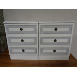 A pair of three drawer bedside chests (white).