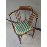 An Edwardian inlaid mahogany corner armchair