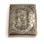 A silver cigarette case depicting a classical scene