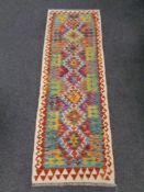 A Chobi kilim runner 191cm by 65cm